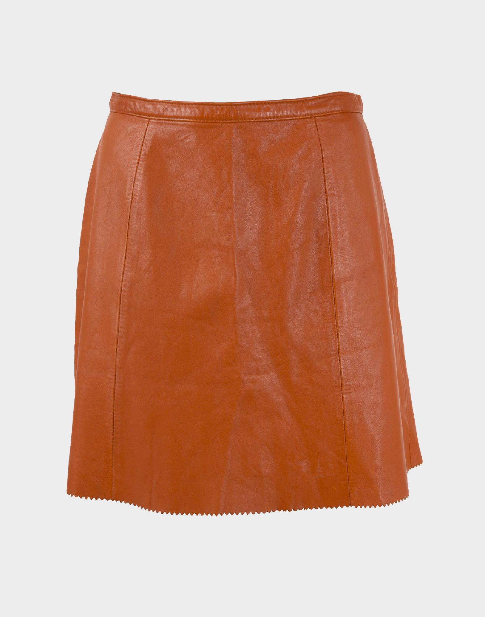 Flared orange leather skirt with back zip and button closure. Photographed on a ghost mannequin against a gray background.