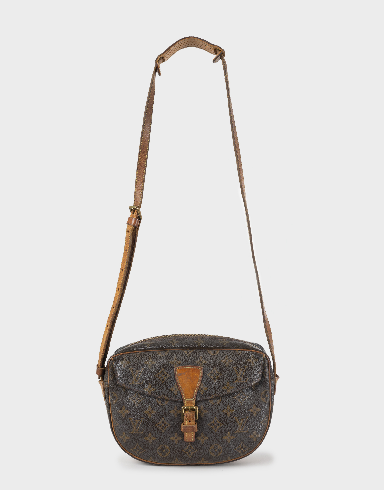 brown leather women's crossbody bag with monogram pattern