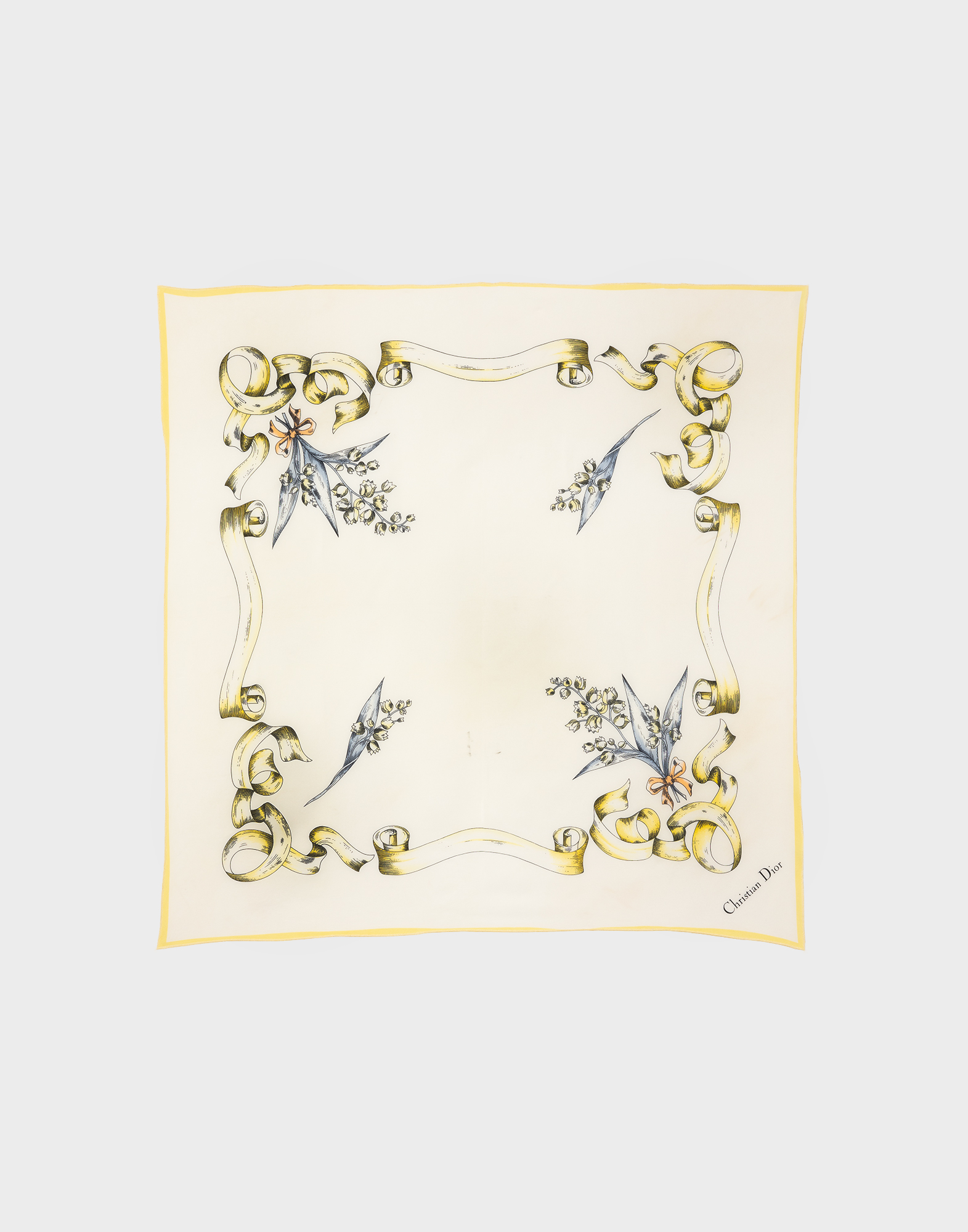 Square silk handkerchief in ivory and yellow with bows and ribbons.