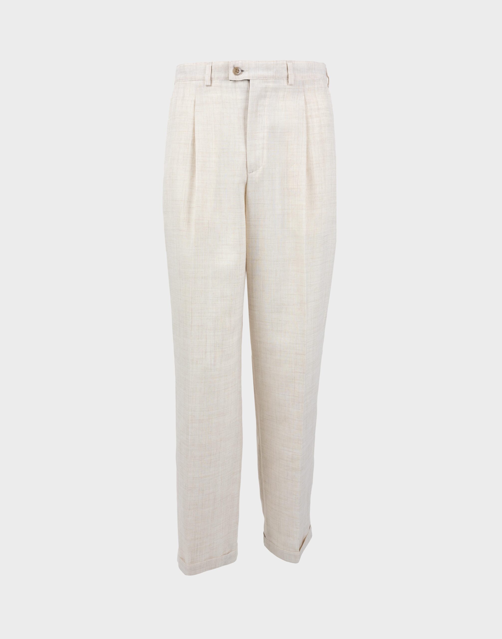 Beige linen trousers for men with front pleats and cuffs at the bottom.