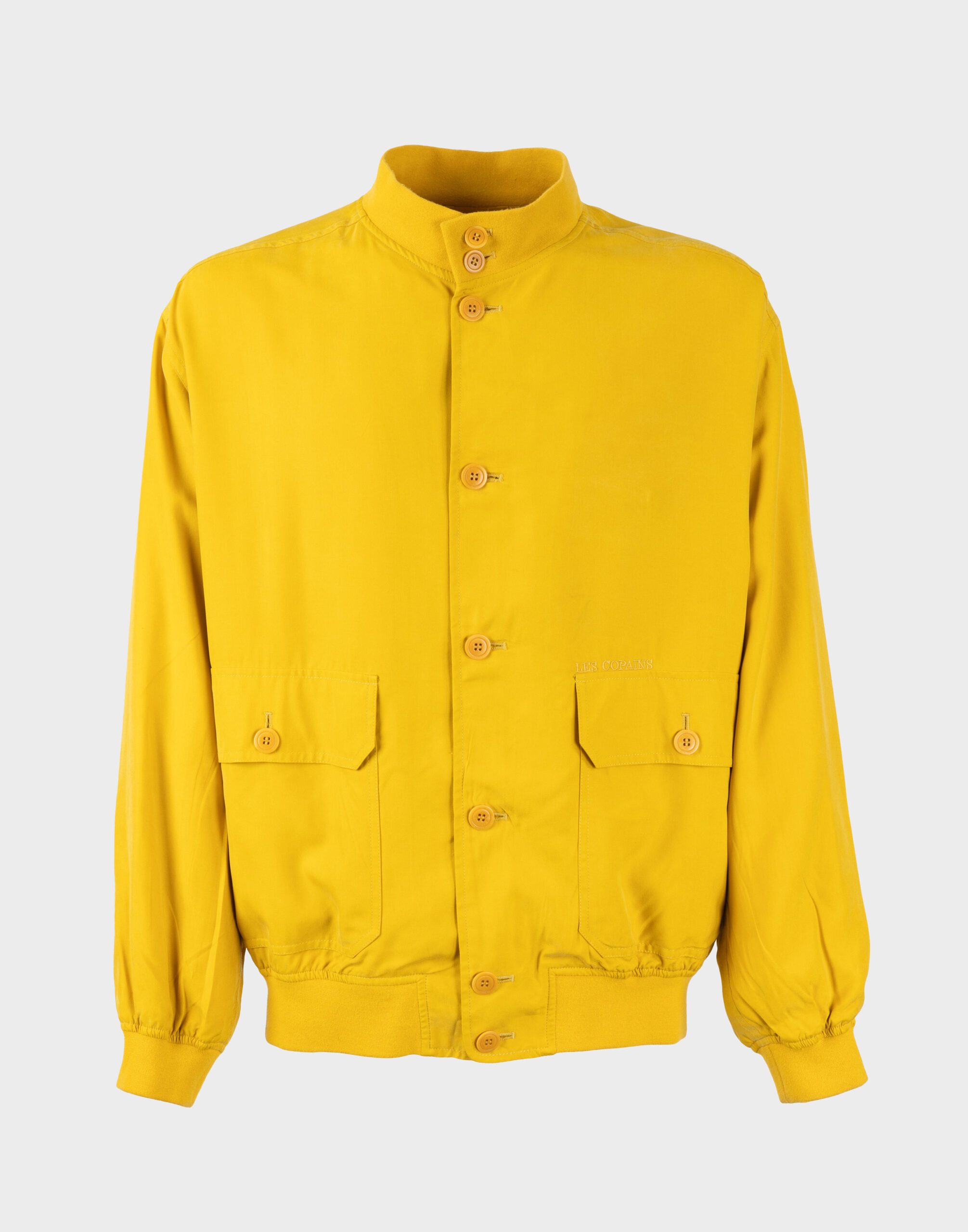 Men's yellow bomber jacket with elastic at the neck, bottom, and cuffs. Front closure with yellow buttons and two pockets.