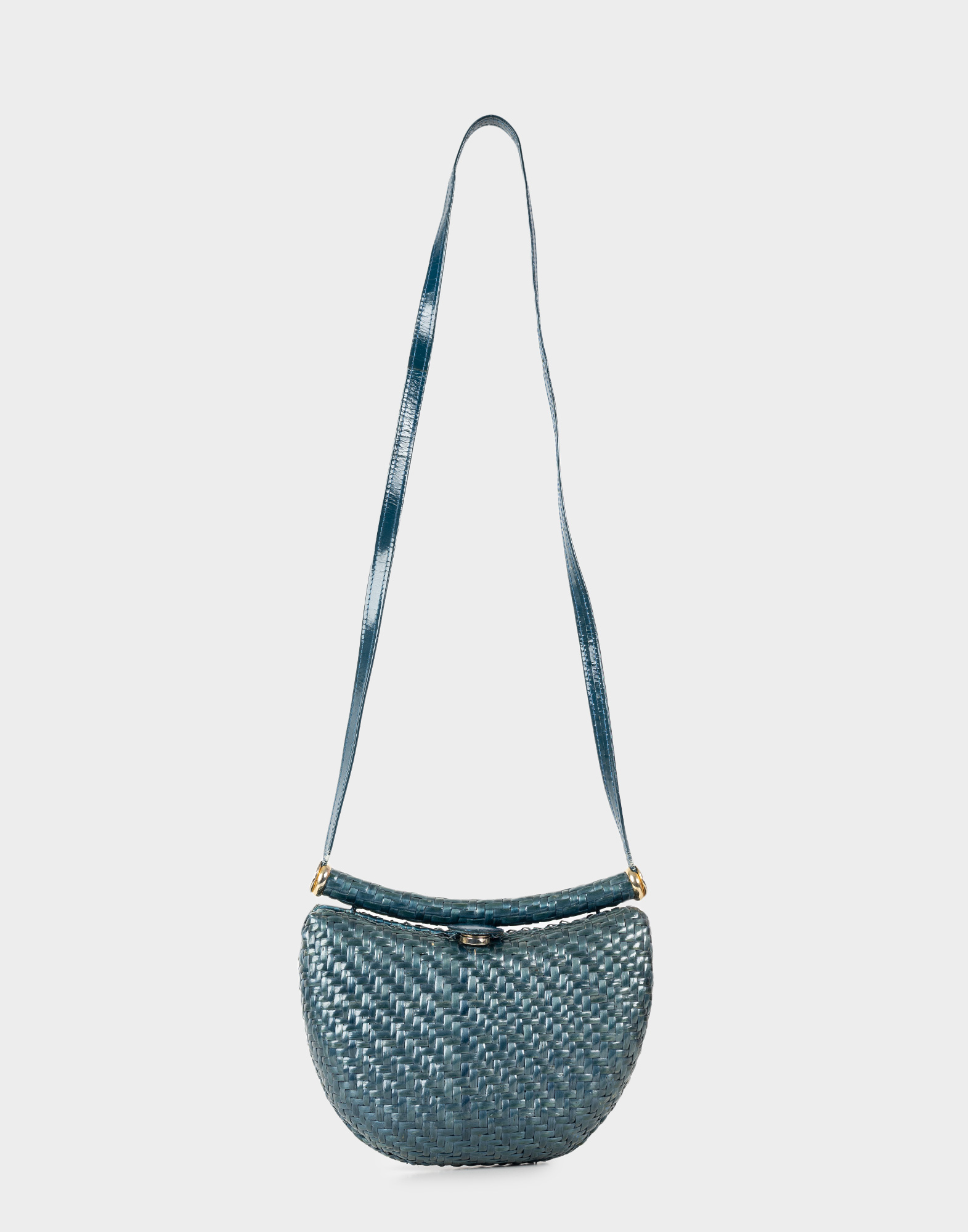 80s light blue wicker straw bag with a long leather shoulder strap.