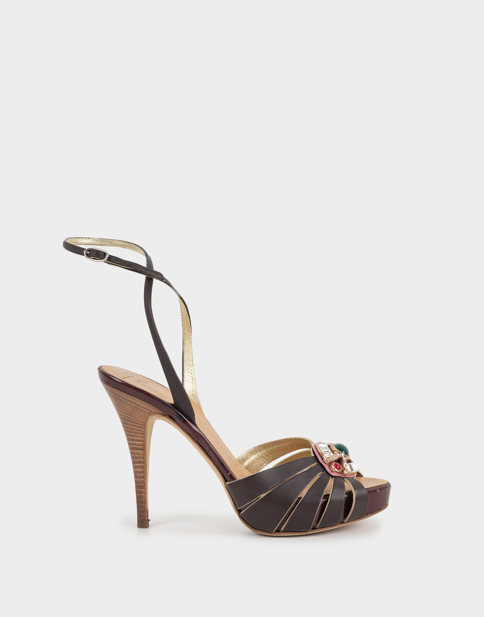 Brown leather women's sandals with ankle strap, thin stiletto heel, and colored stone applied on the toe.