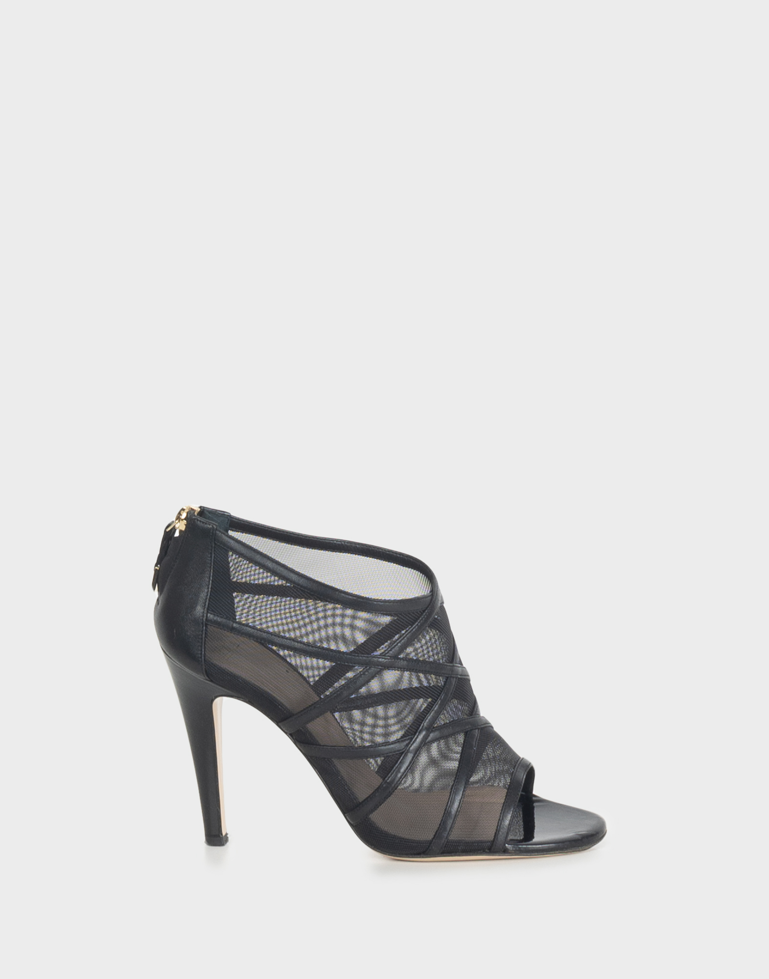 Women's black mesh shoes with a thin leather heel.