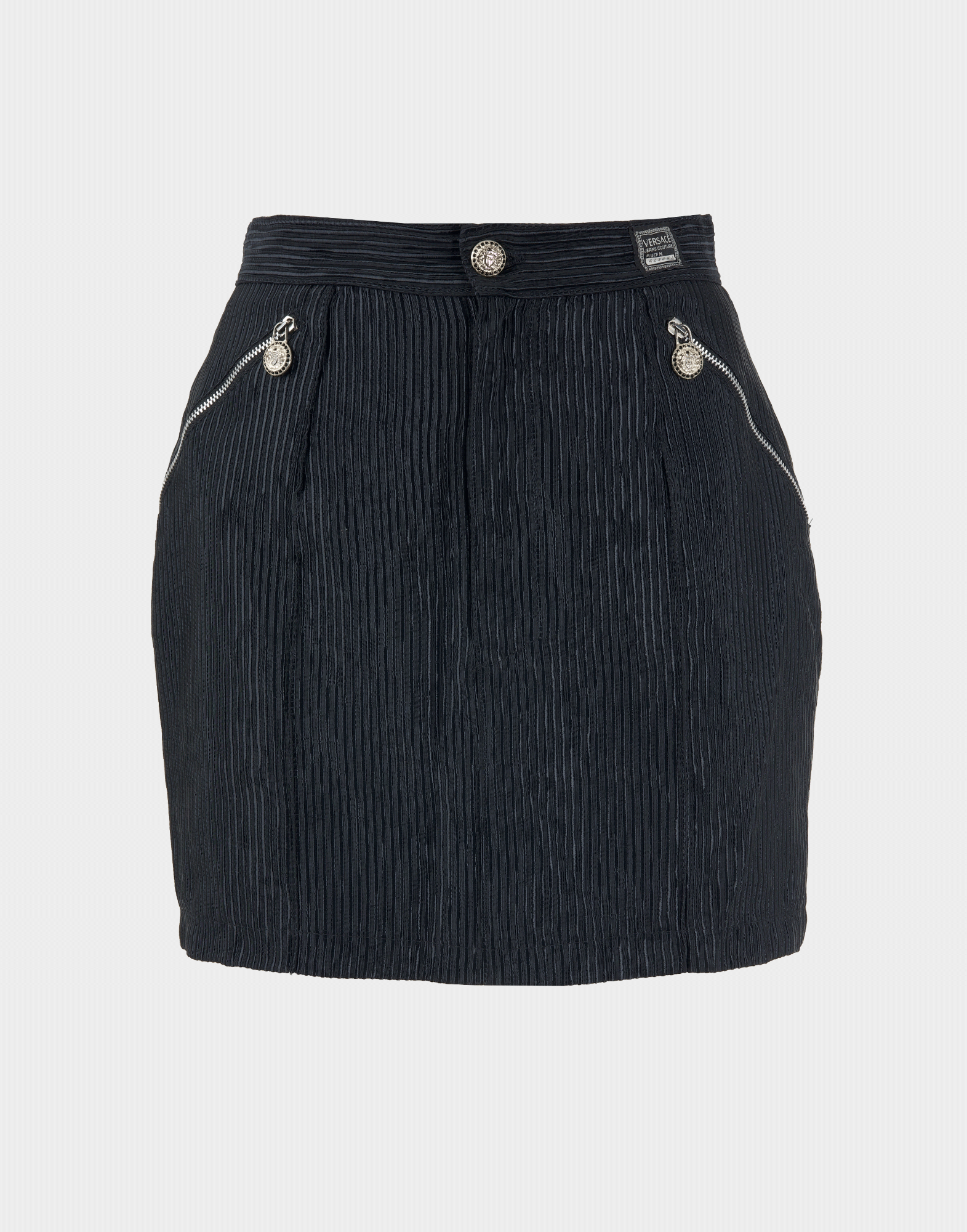 Women's black mini skirt from the '90s, button closure and zippered pockets