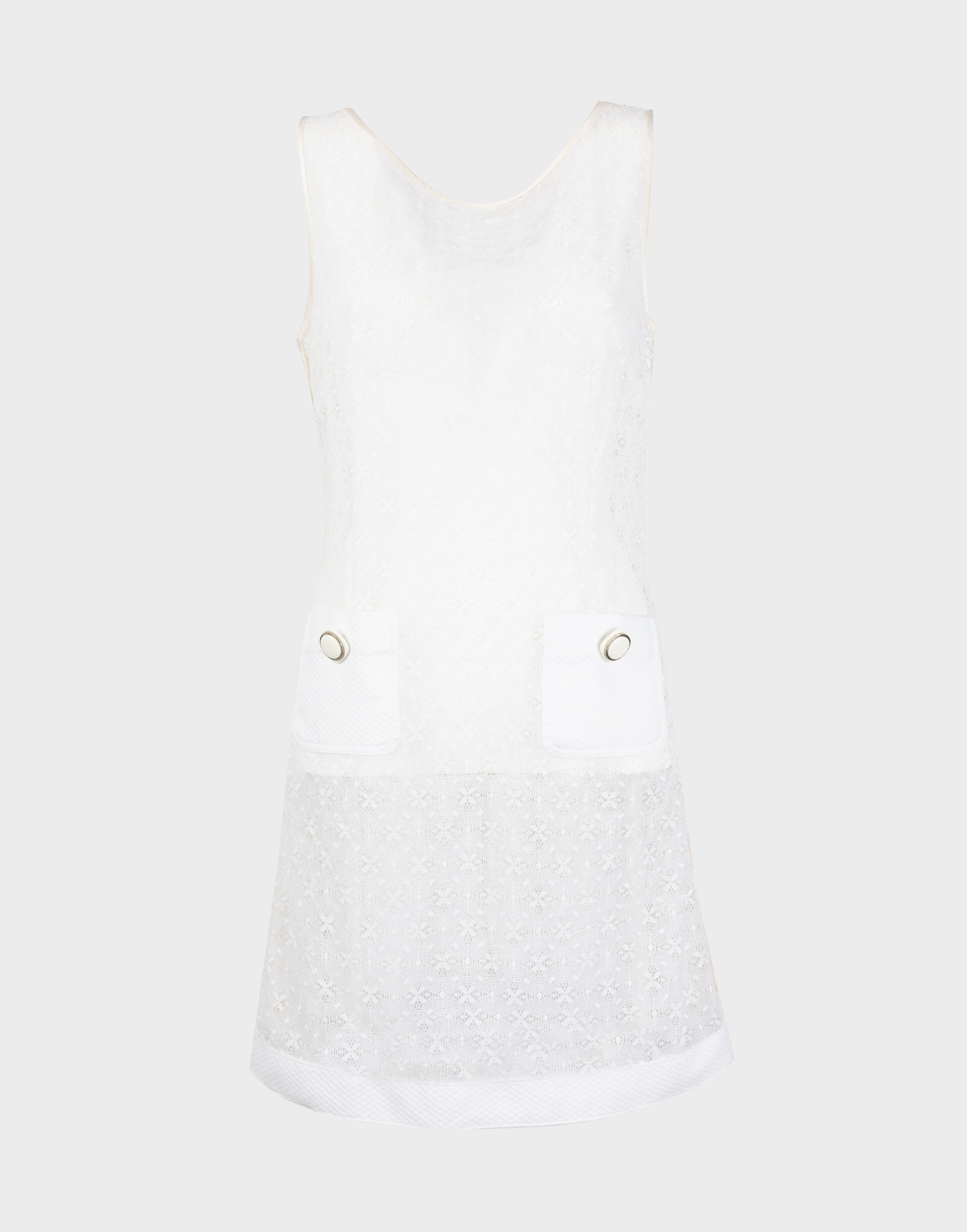 white women's dress in macramé fabric, round neckline and two front pockets with buttons