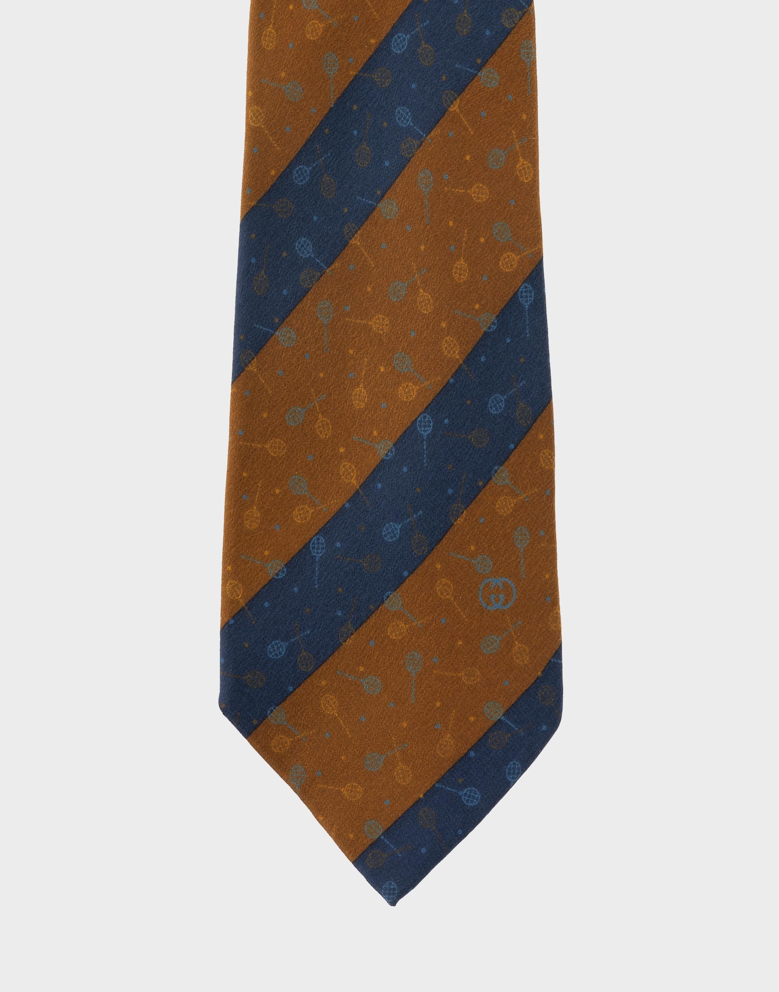 men's silk tie with brown and blue diagonal stripe pattern, tennis rackets