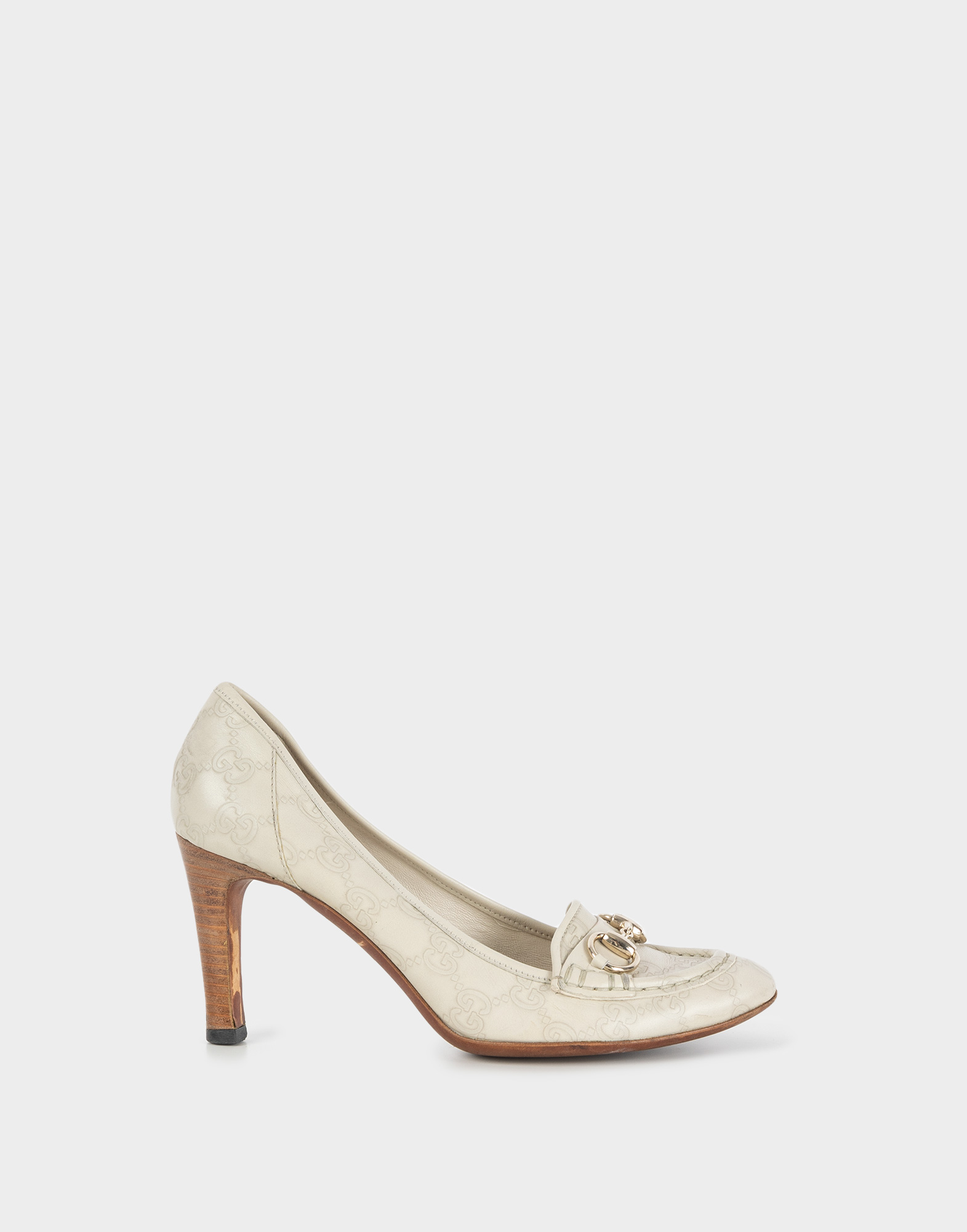 beige leather heel shoe with GG monogram pattern and wooden heel