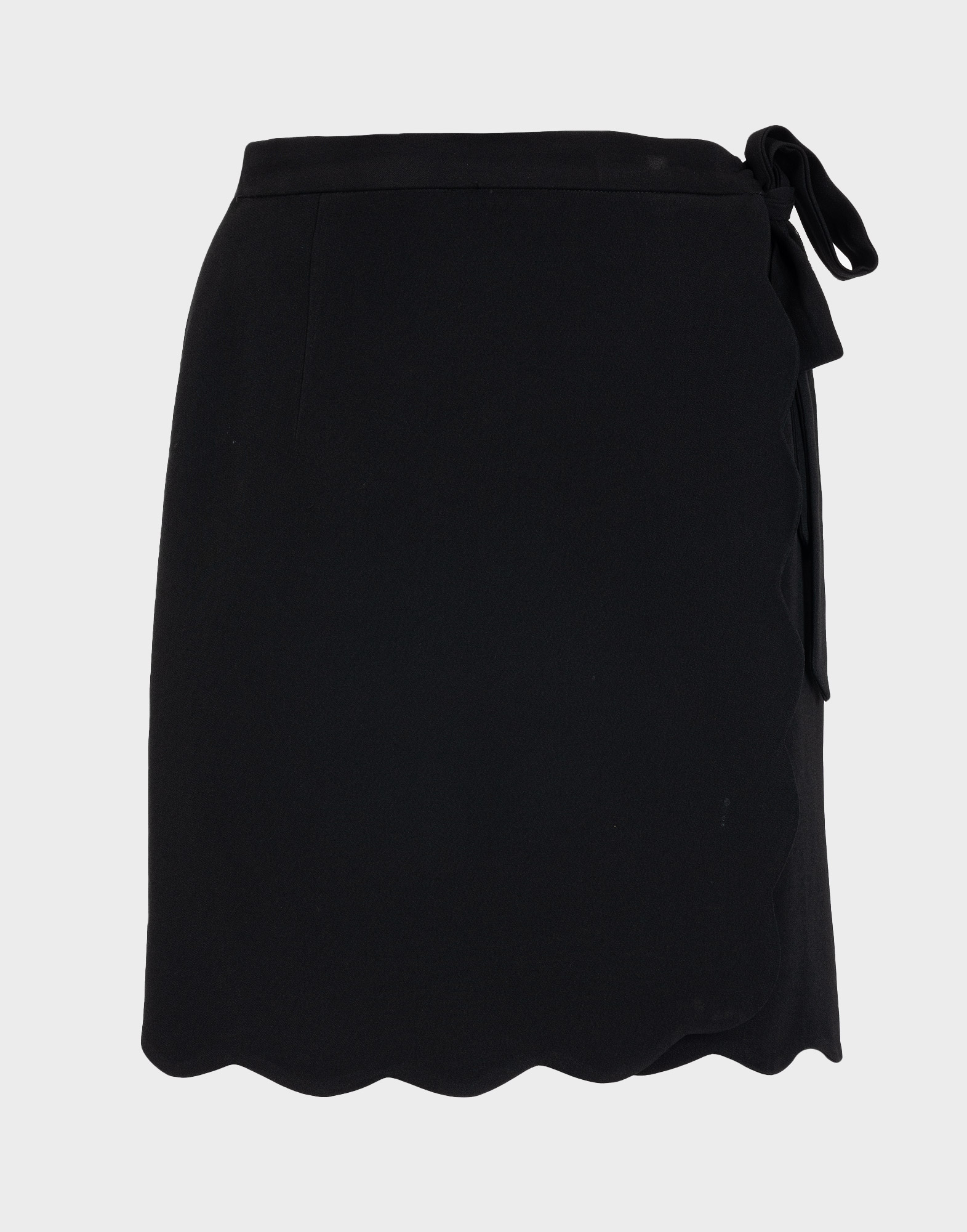 black pencil skirt with wavy hem and bow at the side