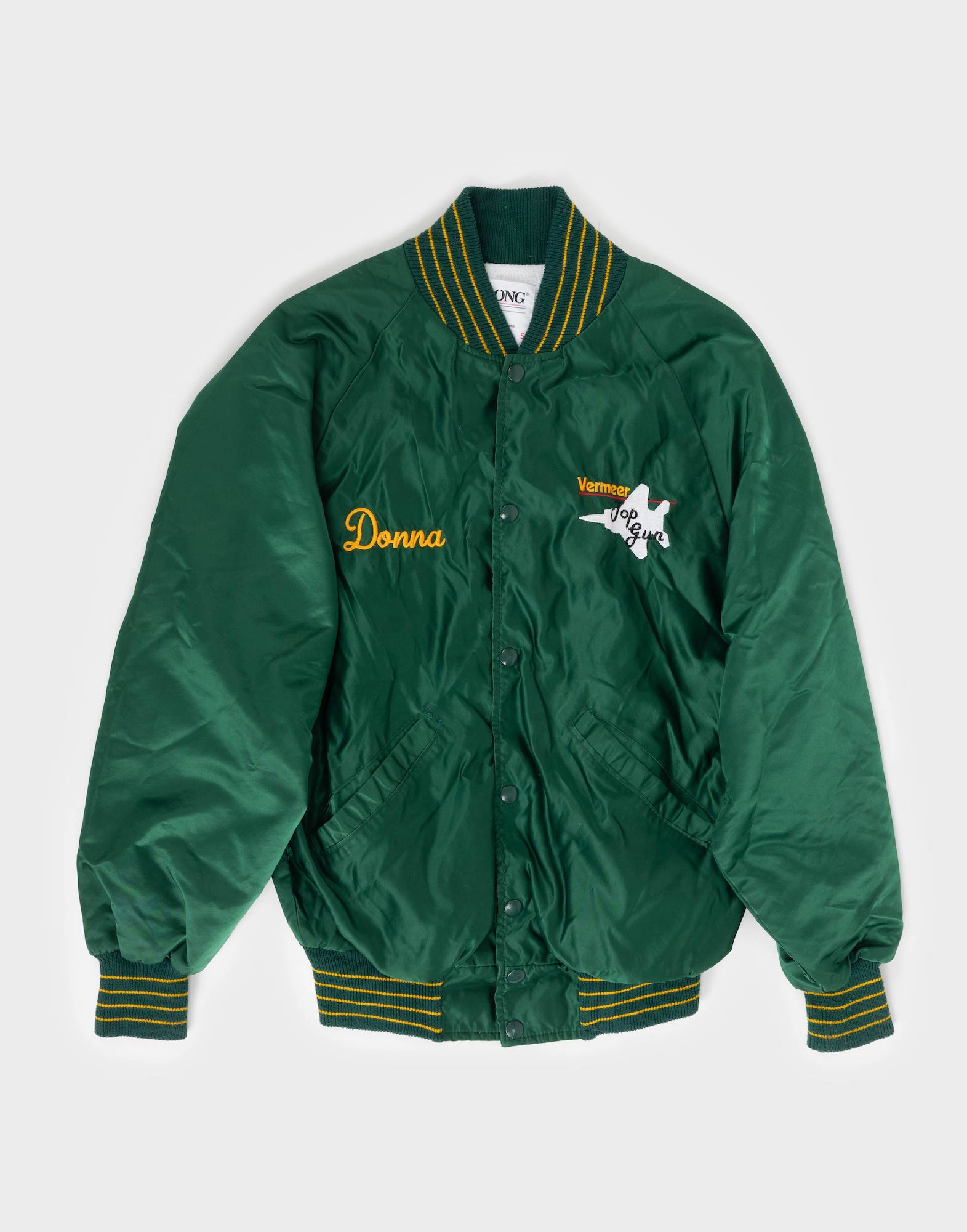 green nylon college jacket with yellow embroidered text on the front, button fastening