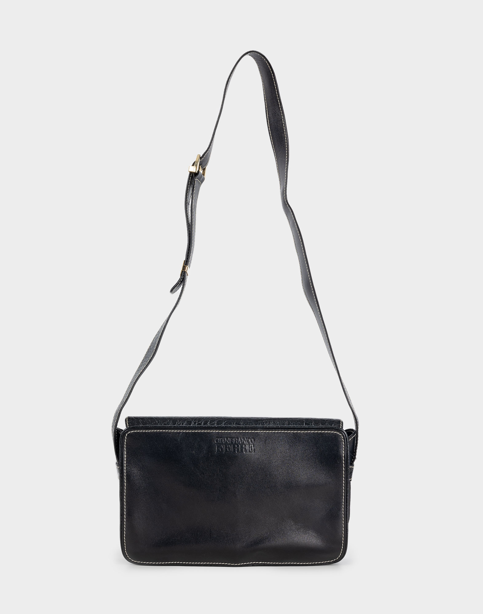 black leather bag with adjustable shoulder strap, contrasting white stitching