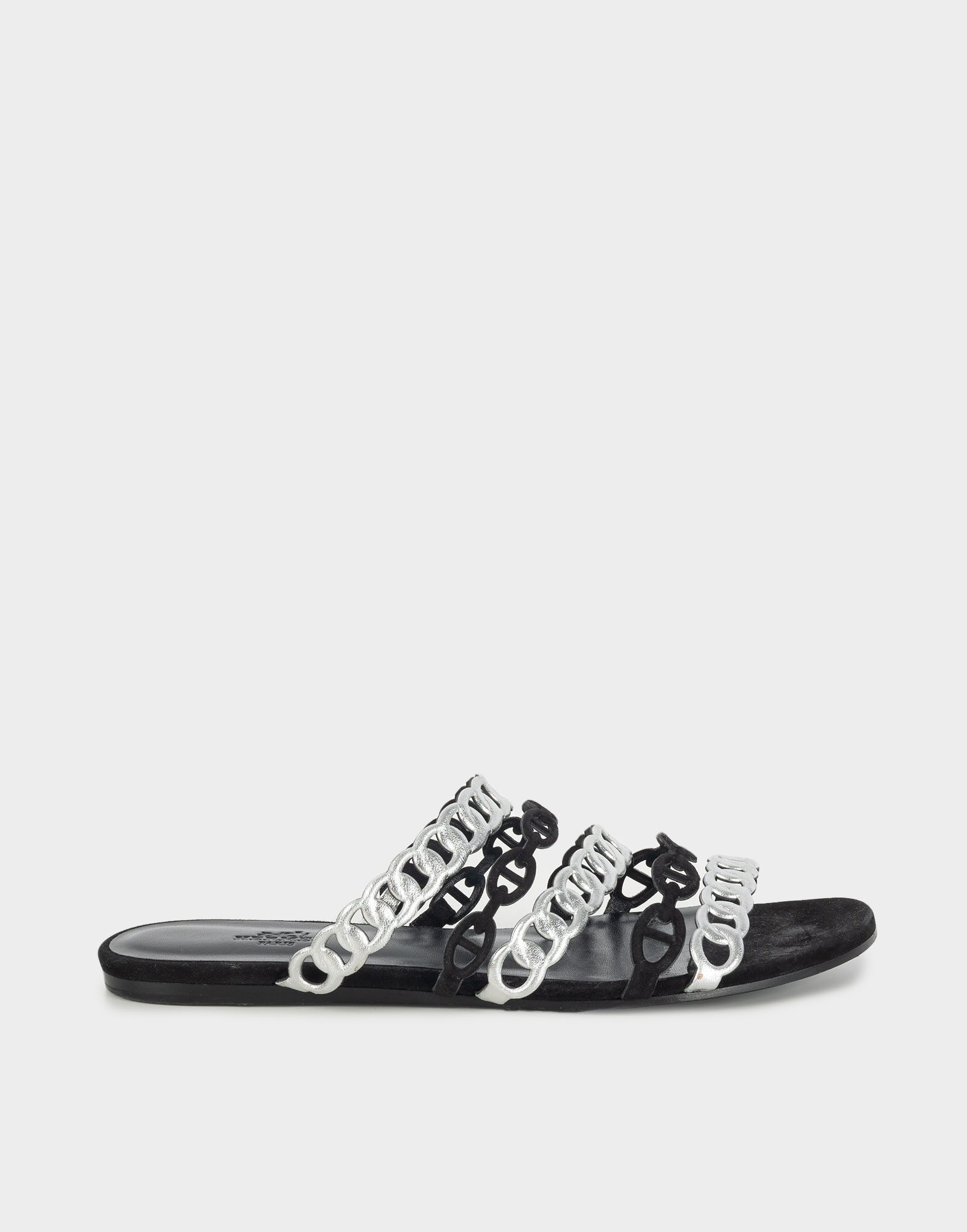 women's black leather low sandals with black and silver braided strap