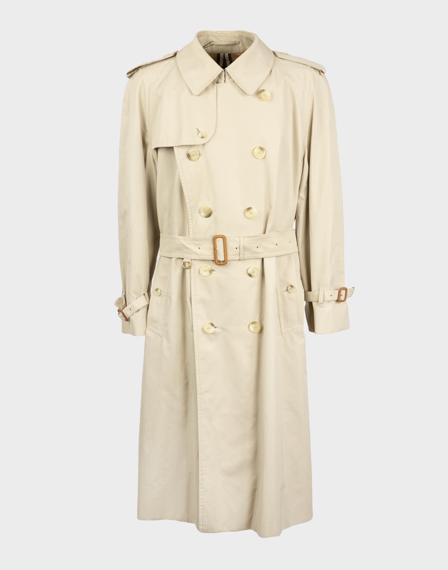 Beige men's cotton trench coat with double-breasted closure and adjustable waist belt, branded by Burberrys.