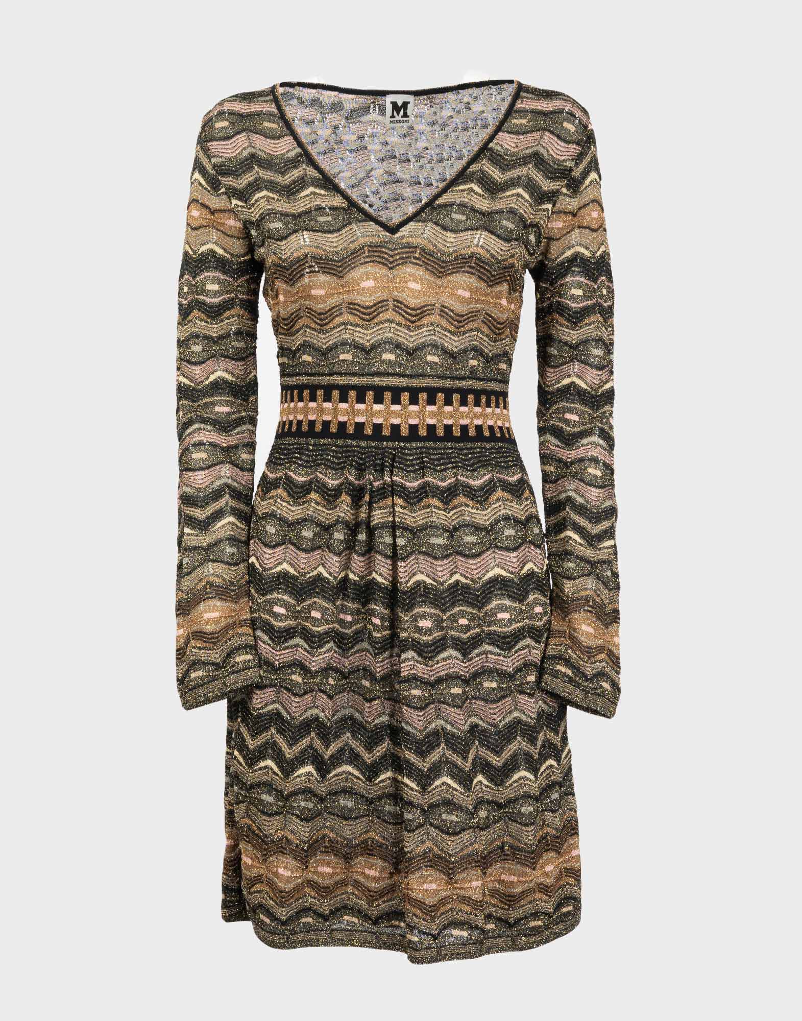 Women's mini dress with black and gold geometric pattern, elastic waist, long sleeves, and V-neckline.