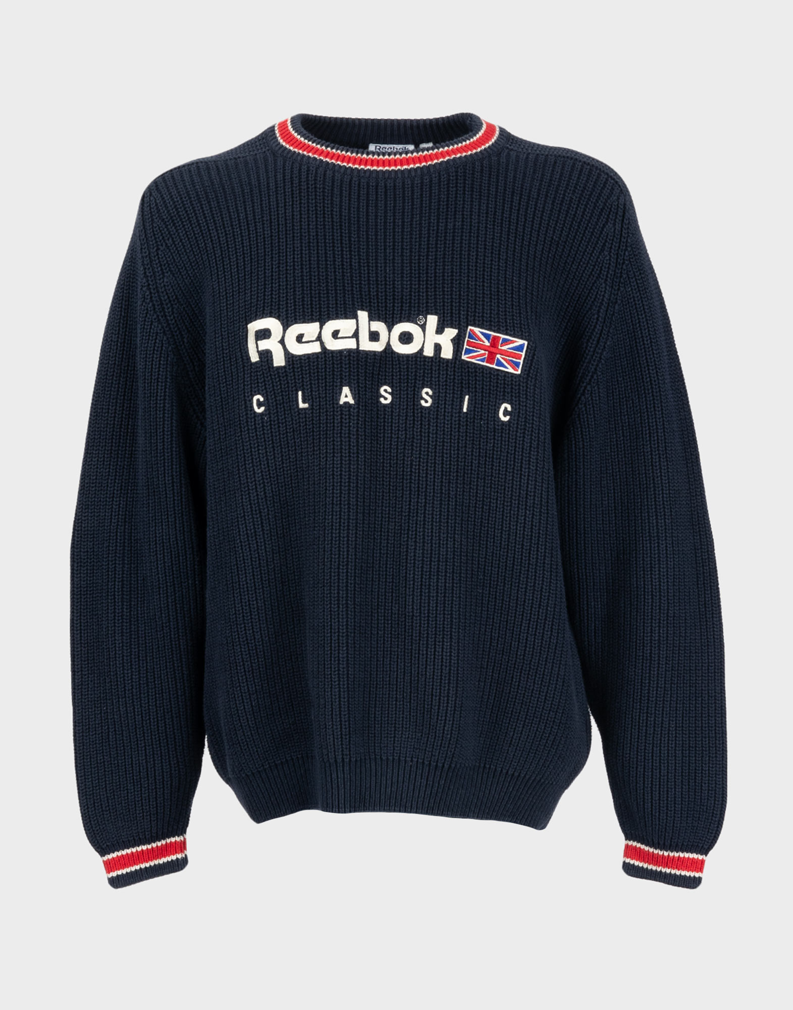 blue sweater with red logo details